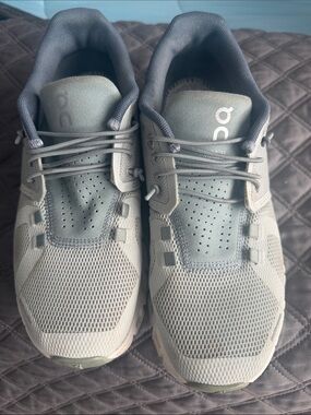 On Running Sneakers in Light Gray and Pale Blue